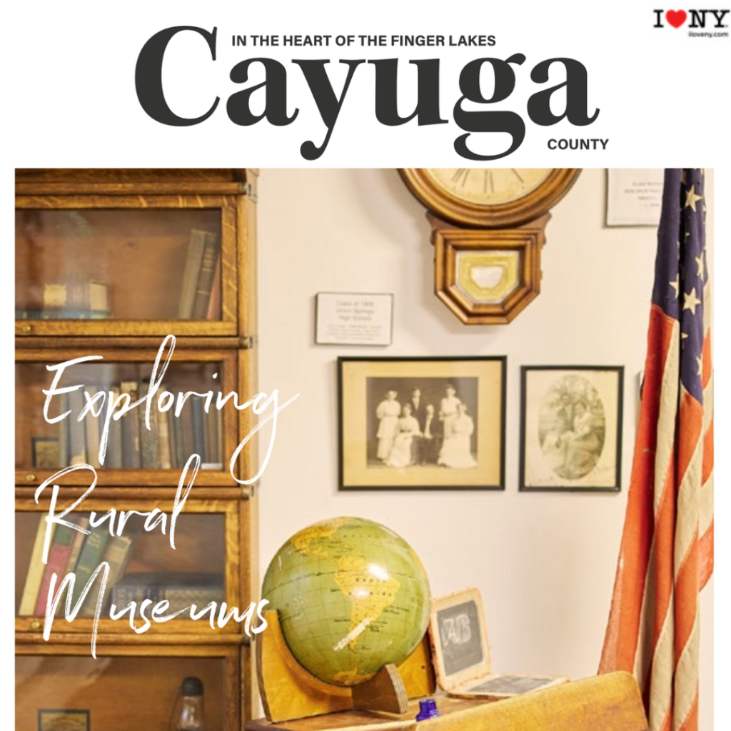 cover of Exploring Rural Museums magazine. picture shows an old desk and a round globe